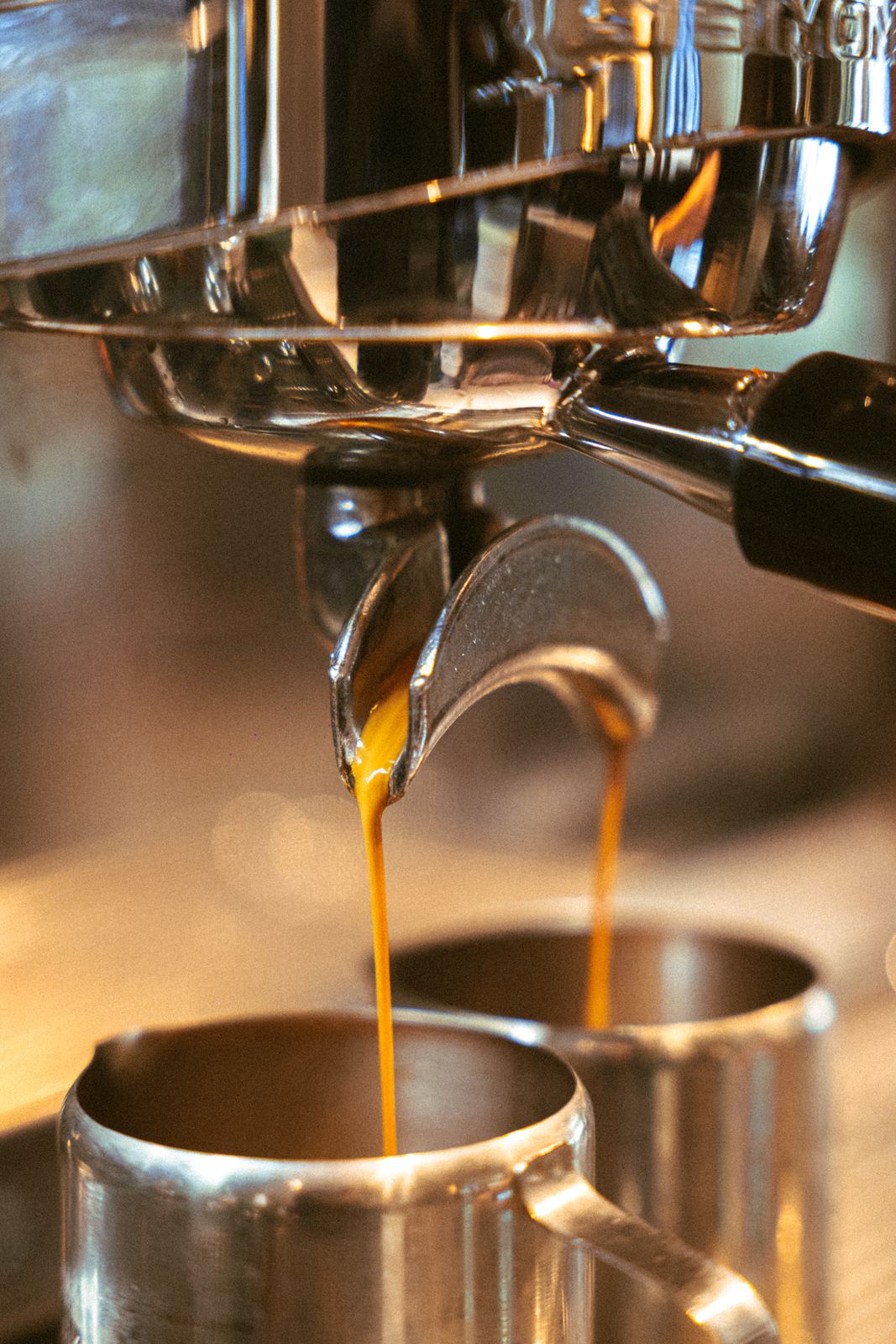 Espresso running into two cups